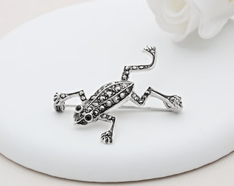 Broche de rana divertida de plata de ley