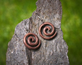 Beautifully handmade Spiral Earrings made from recycled wood hung on sterling silver hooks and gift boxed free of charge. 2.5cm