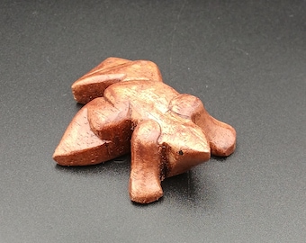 Cute pocket sized Wooden Frog. Handcarved,sanded and polished to a high standard with lots of detail and a princess charming  smile (7x5cm)