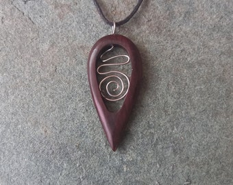Beautifully handmade Teardrop Pendant made from recycled wood and Stainless Steel hung on a adjustable waxed cotton thong and measuring 3cm
