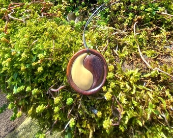 Beautifully handmade wooden Ying Yang pendant hung on a adjustable waxed cotton cord. (3cm)