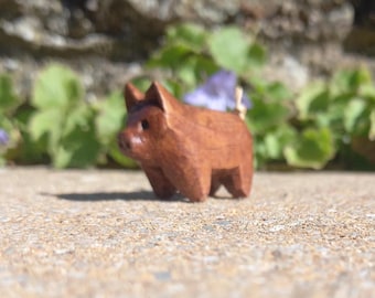 Pocketsized Handcarved wooden Pig polished and stained to a high quality finish,comes to you house trained and well fed!! (2cm)