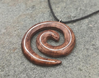 Beautifully handmade wooden Spiral Pendant With a Stainless steel wire inlay hung on a adjustable waxed cotton cord. (3.5cm)