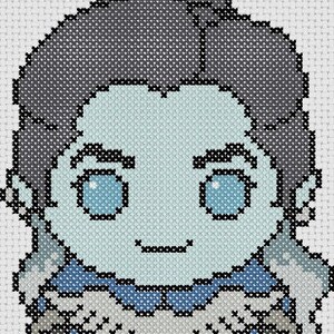 May include: A cross-stitch pattern featuring a stylized character with pale blue skin, dark hair, and bright blue eyes. The figure wears a dark blue outfit with a white collar, a yellow cape, and dark boots, all rendered in a grid-like pixelated style.