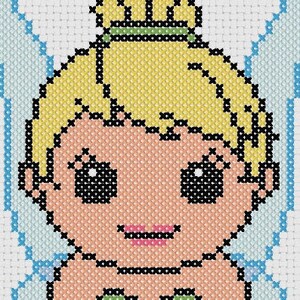 May include: A cross-stitch pattern featuring a stylized character with blonde hair in a bun, large dark eyes, and a green dress. The figure has light blue wings extending from the back, all rendered in a grid-like embroidery stitch style.