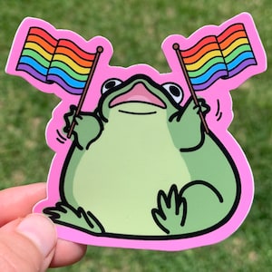 Frog Waving Two Rainbow Pride Flags Sticker / Cute Funny Queer Gay Pride Month Decal Cheap Simple Thinking of You Gift Car Bumper Laptop Fun
