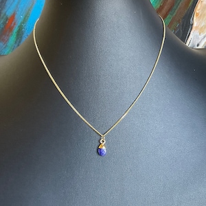 Delightful dark blue lapis gemstone in gold on gold vermeil chain. Small w/excellent blue color!  Excellent quality! Sophisticated 16”-18”