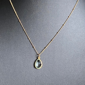 Sparkling aquamarine teardrop pendant on gold vermeil satellite chain. Stunning, perfect for every occasion and everyone. Great for layering