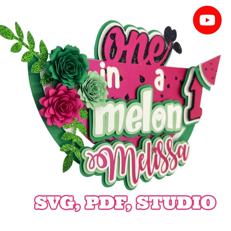 May include: A pink and green watermelon-themed cake topper with the text "One in a melon" and the name "Melissa". The topper is decorated with green leaves and pink and green paper flowers.