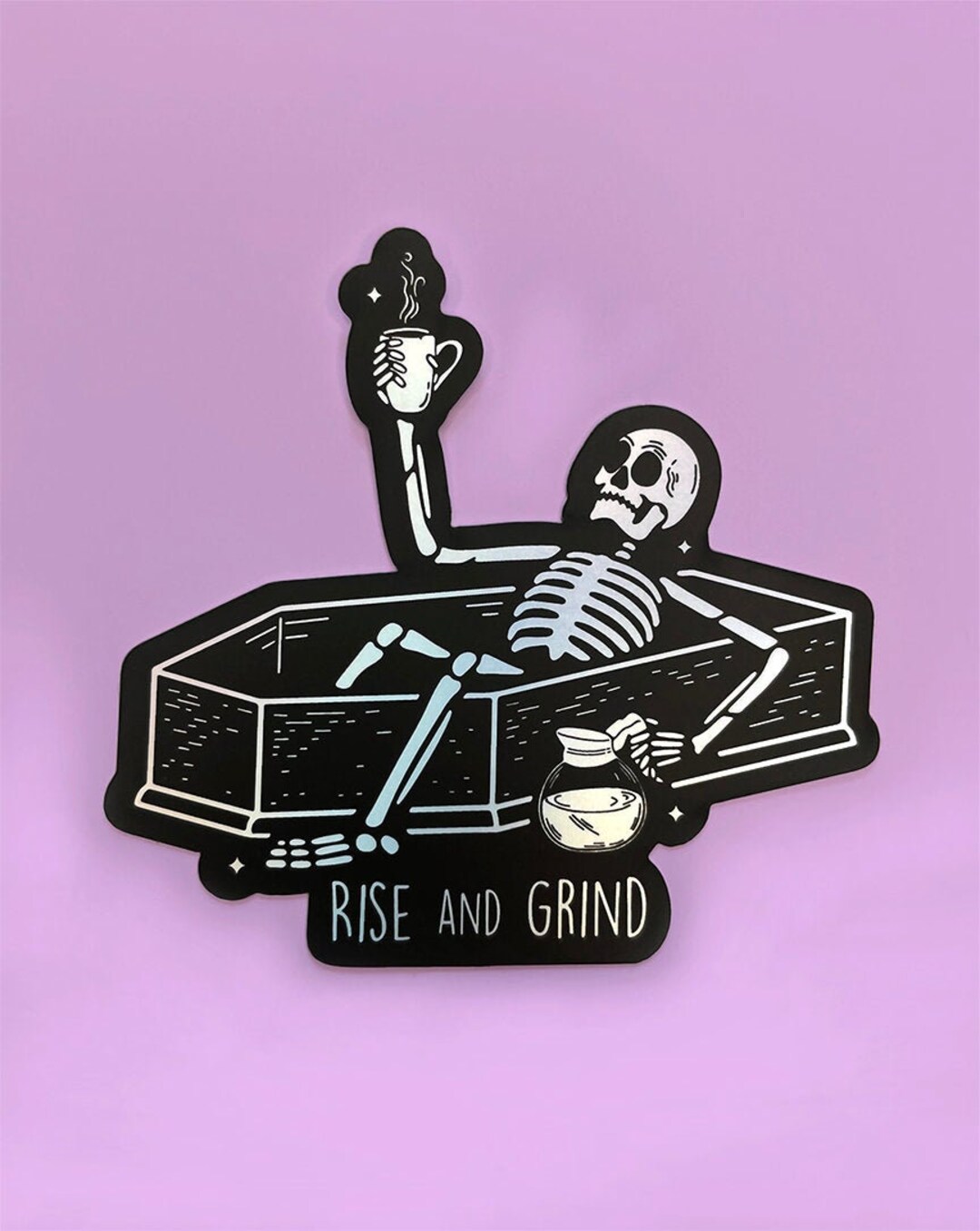 Rise and Grind Matte Holographic Sticker, skeleton, coffee, morning, coffin, waterproof, stationery, hydro flask, water bottle, laptop