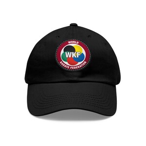 May include: Black baseball cap with a World Karate Federation logo featuring a red, white, blue, green, and black circle with the letters WKF.
