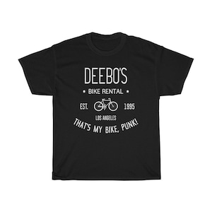 May include: Black t-shirt with white text that reads "DEEBO'S * BIKE RENTAL * EST. 1995 LOS ANGELES THAT'S MY BIKE, PUNK!" and a white silhouette of a bicycle.