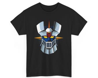 Op de afbeelding: Een zwart t-shirt met korte mouwen en een grafische print van een gestileerd robot hoofd. De robot heeft een blauw gezicht, gele ogen, een zilveren roosterachtige mond en grote zilveren oorachtige uitsteeksels met een rode antenne.