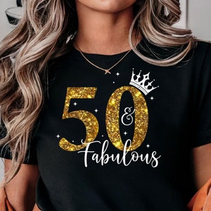May include: Black t-shirt with gold glitter lettering that says "50 & Fabulous" with a crown above the 0.