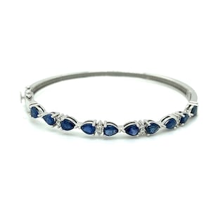 Sapphire and Diamond Bangle: 14k White Gold September Birthstone