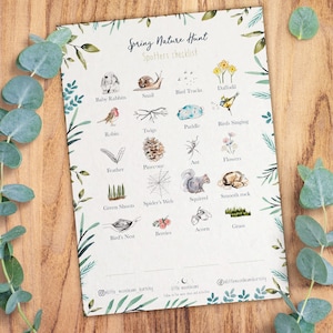 May include: A printable checklist for a spring nature hunt. The checklist features illustrations of various spring items, including baby rabbits, a snail, bird tracks, daffodils, a robin, twigs, a puddle, birds singing, a feather, a pinecone, an ant, flowers, green shoots, a spider's web, a squirrel, a smooth rock, a bird's nest, berries, an acorn, and grass.