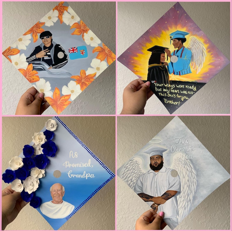 May include: Four graduation caps featuring custom painted designs. One shows a person with the Fiji flag and orange flowers. Another depicts an angel with a graduate and text. A third has blue and white paper flowers with text. The last shows an angel with text.