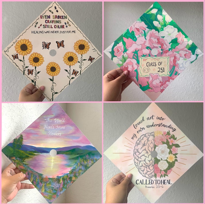 May include: Four square graduation caps decorated with hand-painted designs. One features sunflowers and text, another pink flowers with 'Class of 25!', a third a sunset landscape with 'The World Needs More Healers', and the last a brain and floral motif.