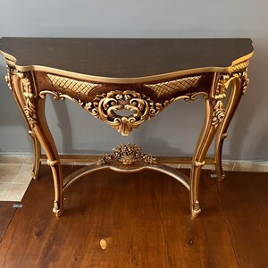 We can also produce the console table top from high quality marble. Please tell us your marble choice and let us find the best match high quality marble for your gilded console table.