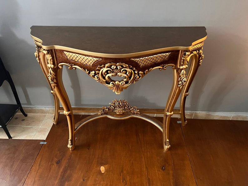 We can also produce the console table top from high quality marble. Please tell us your marble choice and let us find the best match high quality marble for your gilded console table.