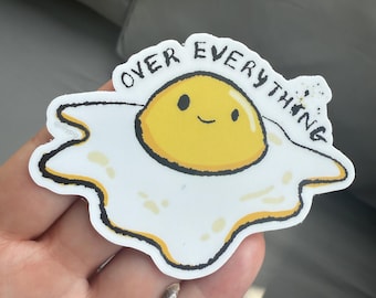 Over Everything Egg sticker / vinyl decal. Featuring a fried egg that is cooked over easy AND over hard. Hashtag relatable, am I right?