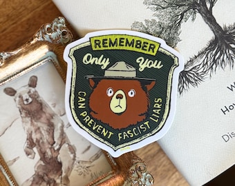 Only You Can Prevent Fascism sticker/ vinyl decal. Featuring Smokey Bear’s cousin who is increasingly worried about late stage capitalism.