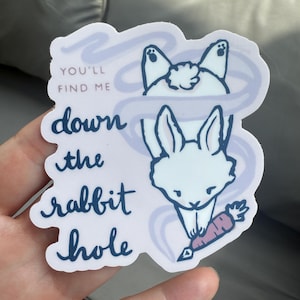 May include: A trio of speckled ceramic mugs in cream, light grey, and dark grey. Each mug has a minimalist design and a matte finish. Ideal for enjoying tea or coffee.