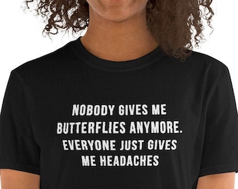 Nobody gives me butterflies anymore. Everyone just gives me headaches - Funny Shirt, Funny Saying Shirt, Short-Sleeve Unisex T-Shirt