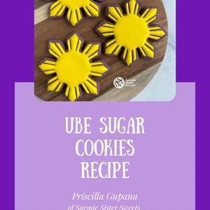Puede incluir: Tres galletas de azúcar Ube con diseño de sol, con centros amarillos y bordes morados, dispuestas sobre una tabla de madera. La imagen también incluye el texto "UBE SUGAR COOKIES RECIPE".