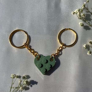 Partner friendship heart keychain with two building blocks in gold