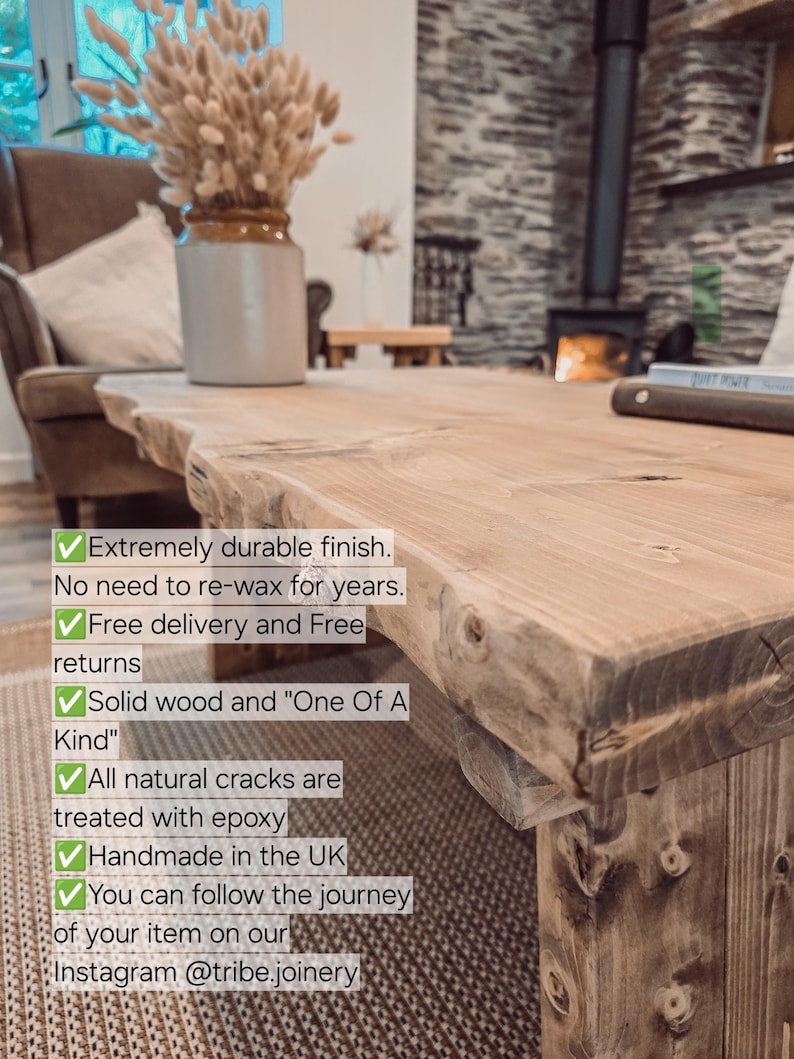 May include: A close-up of a wooden table with a natural, rustic finish. The table is made of solid wood and has a unique, one-of-a-kind character. The table is treated with epoxy to protect it from cracks and damage. The table is handmade in the UK and is available for purchase on Instagram @tribe.joinery.
