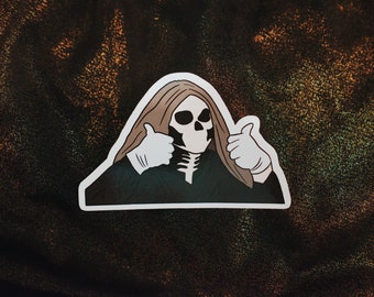 May include: A sticker of a person wearing a skull mask and giving a thumbs up with both hands. The person has long brown hair and is wearing a black shirt.