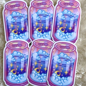 May include: Six colorful stickers of a can filled with a blue and purple liquid with white clouds and stars. The can has a pink and yellow striped design.