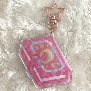 Keychain Magic Book Kawaii Magical Girl Anime Style Acryl Charm Epoxy Holographic Gift Keyring Accessoires Magical Charm Spellbook Moon Bild 4