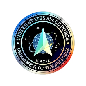 May include: A circular emblem with a blue, green, and white star on a black background. The text around the star reads "United States Space Force Department of the Air Force".
