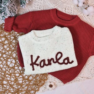 Handgestickter Weihnachtsbaby-Namenspullover, Weihnachtskinder-Strickpullover, Neugeborenes erstes Weihnachtsgeschenk, personalisierter Weihnachtspullover