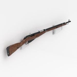 May include: A wooden and black rifle mounted on a wall with a clear acrylic display stand.