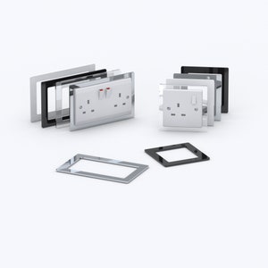 May include: A set of white electrical socket covers with different coloured trim options. The covers are made of plastic and have a sleek, modern design. The trim options include black, silver, and clear.