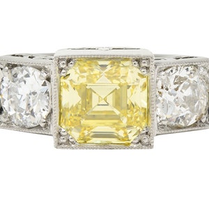 Art Deco 3.20 CTW Asscher Cut Fancy Intense Yellow & Old European Cut Diamond Platinum Foliate Vintage Ring GIA