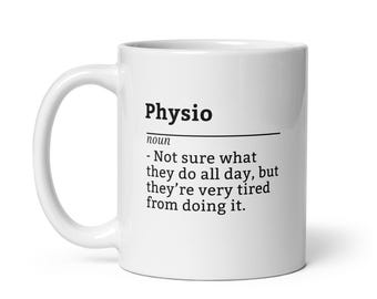 May include: White ceramic mug with the word "Physio" in black, with a definition below. The definition reads: "- Not sure what they do all day, but they're very tired from doing it."