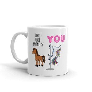 May include: White ceramic mug with a pink and black design. The mug has the text "Other Civil Engineers" on the left side and "YOU" on the right side. The text "YOU" is in a pink circle. A brown horse is on the left side of the mug and a unicorn is on the right side of the mug.