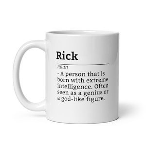 Peut inclure: Tasse en céramique blanche avec le nom "Rick" imprimé en noir, accompagné d'une définition décrivant une personne d'une intelligence extrême, souvent considérée comme un génie ou une figure divine.
