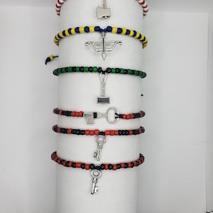 Elegua,eshu,oggun, ochosi,shango ,yemaya,charm bracelets