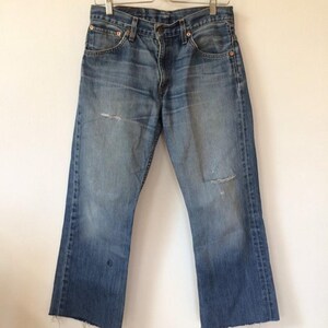 Calça jeans Levi&#39;s desbotada vintage cortada