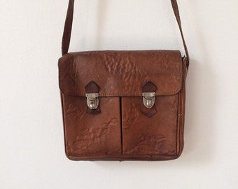 Sac bandoulière vintage en cuir marron vieilli