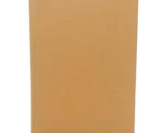 May include: A hardback book with a plain, light brown cover. The book's spine is visible on the left, and the cover has a slightly textured appearance. The edges of the book are worn, suggesting it is vintage.