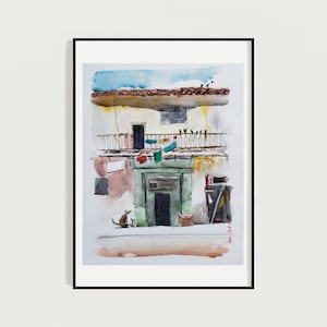 May include: Watercolor painting of a building with a balcony and a green door. There are birds flying above the building and laundry hanging on a line on the balcony. There is a dog sitting in front of the building.