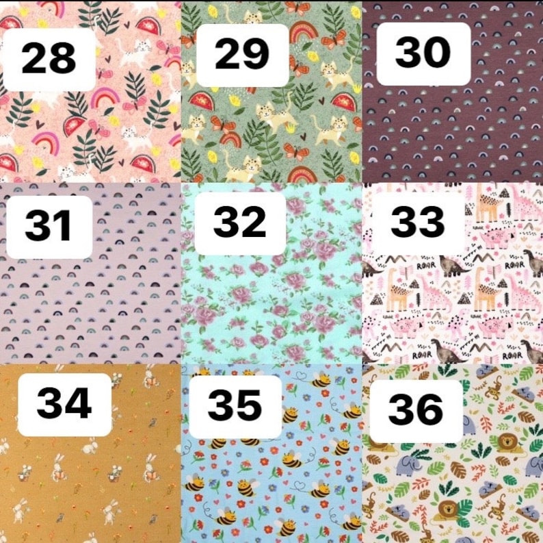 Pode incluir: Uma cole&ccedil;&atilde;o de amostras de tecido, cada uma com um padr&atilde;o &uacute;nico. Os designs incluem arco-&iacute;ris, gatos, dinossauros, abelhas e arranjos florais. As amostras est&atilde;o numeradas de 28 a 36, oferecendo uma variedade de cores e temas.