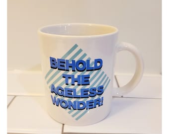 Behold The Ageless Wonder Coffee Mug Cup Retro Vintage 1987 Blue White