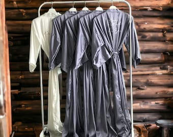 Bridesmaid robes long ankle calf length in dusty blue silk satin and personalized for the bridal party and mother of the bride and groom.